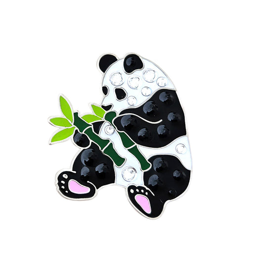 Panda-shaped object with rhinestones on a white background