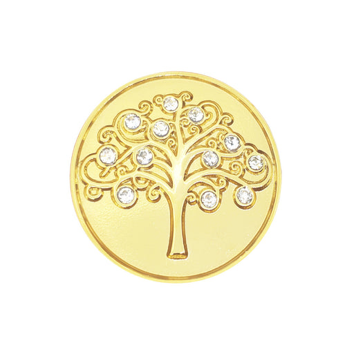 Gold coin with a tree design and embedded crystals on a white background