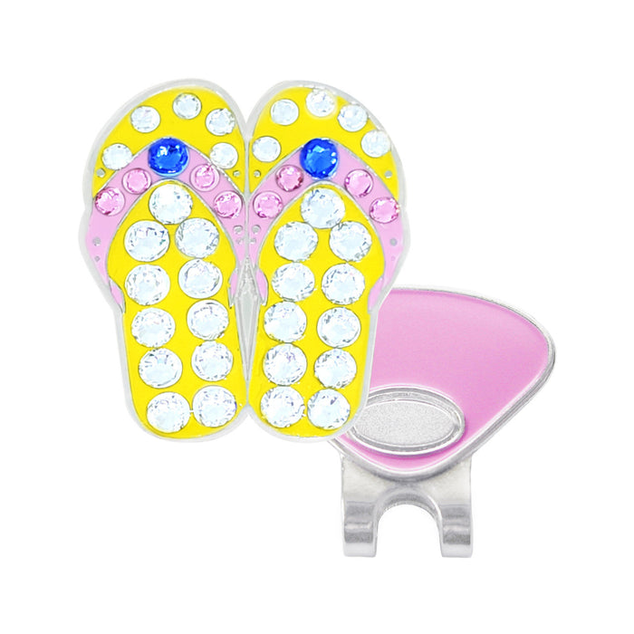 Flip-flop design with rhinestones and a magnetic clip on a white background