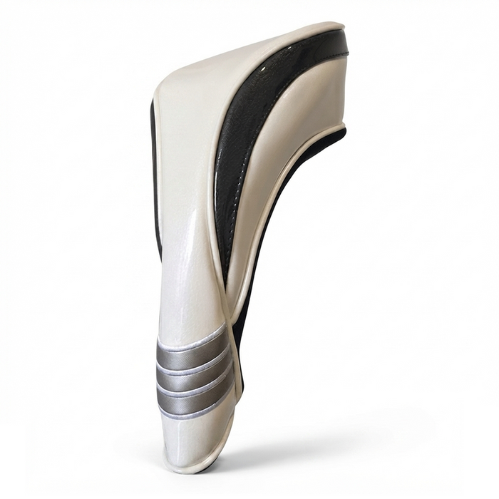 A glossy off-white headcover, a prominent black side stripe, and three metallic silver bands near the base, set against a plain white background.